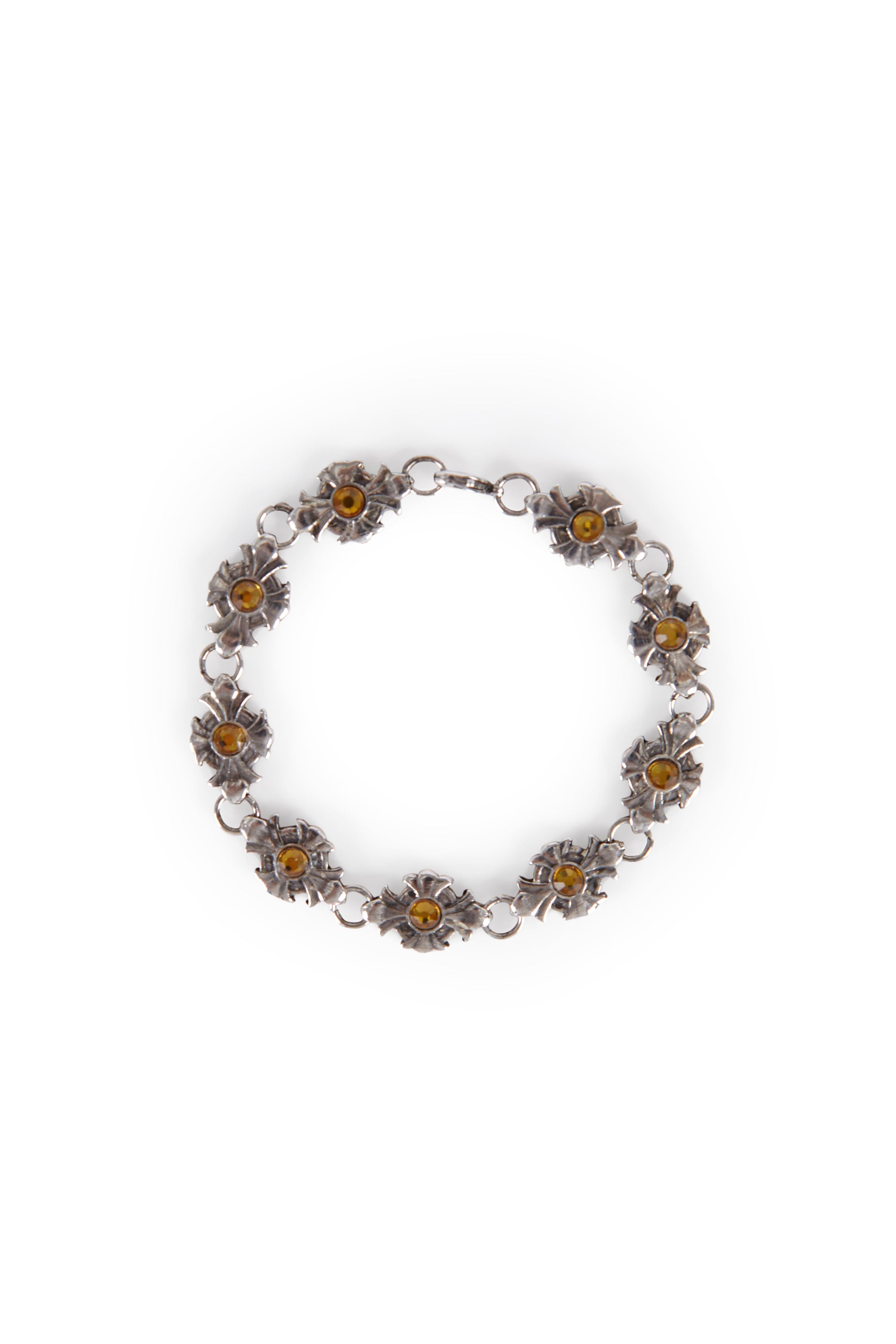 Cross bracelet with yellow stones