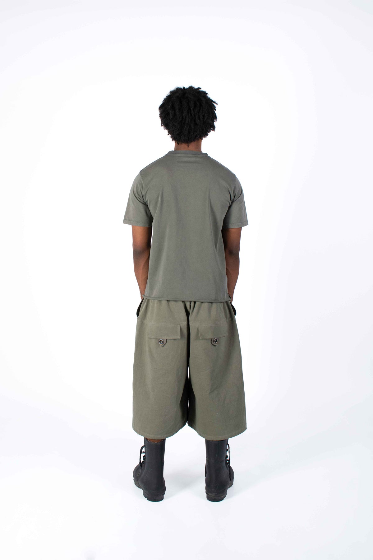 Baggy green cargo shorts back view